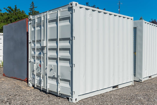 Front view of 8FT gray mini storage container

Side angle of compact steel shipping container

Portable storage containers in different sizes

Bi-parting swing doors and back entry detail

Onsite use of mini steel storage box