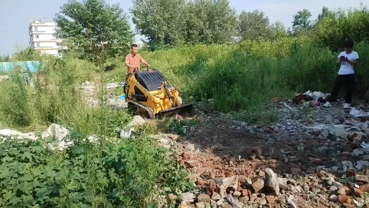 “T380 compact skid steer loader with rubber tracks”

“T460 mini tracked loader for landscaping and excavation”

“Heavy-duty skid steer with universal quick attach plate”

“Tracked compact construction loader in yellow”