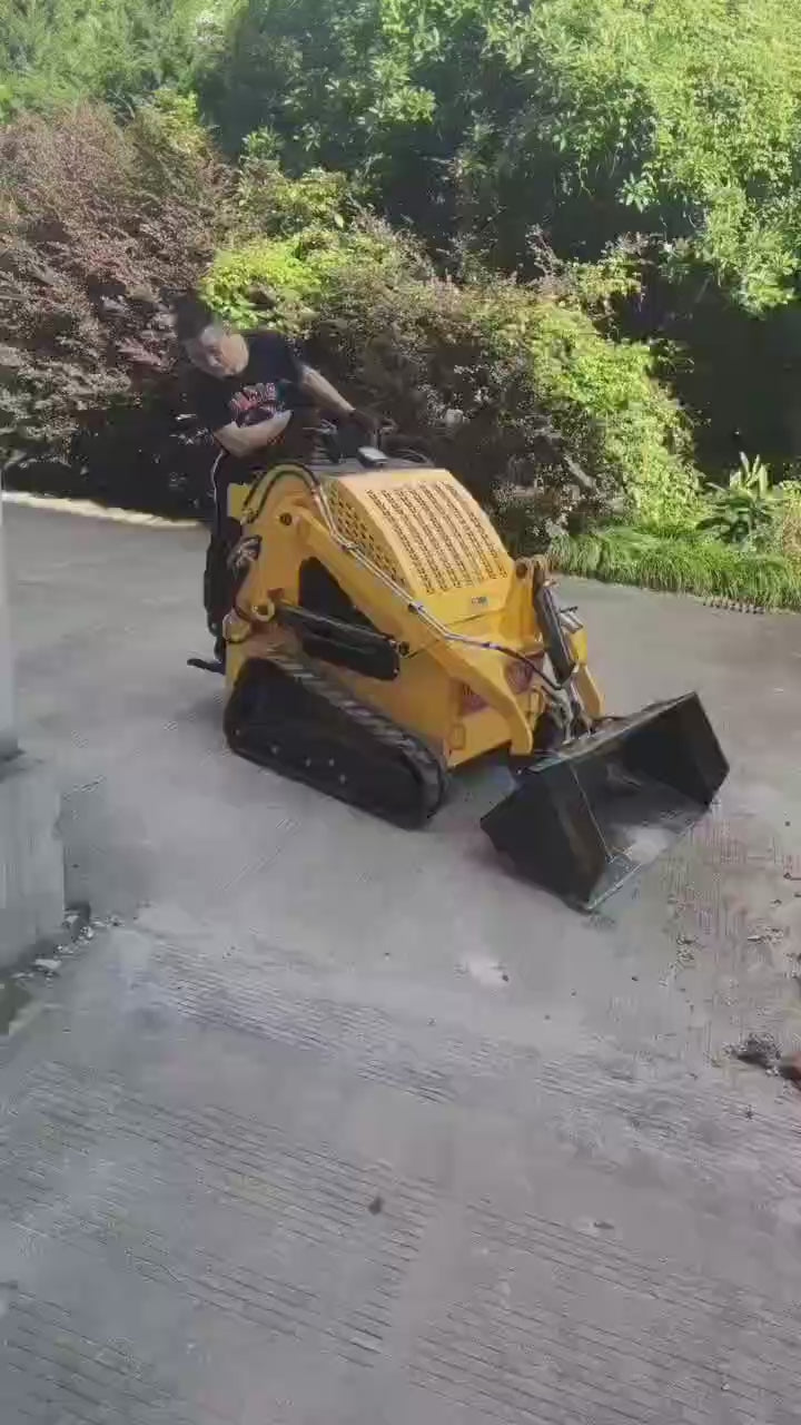 “T380 compact skid steer loader with rubber tracks”

“T460 mini tracked loader for landscaping and excavation”

“Heavy-duty skid steer with universal quick attach plate”

“Tracked compact construction loader in yellow”