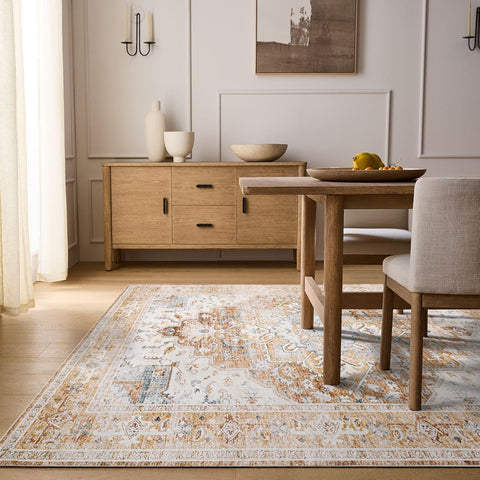 PureCozy 6x9 brick red washable area rug with vintage distressed design in a bedroom and living room setup