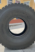Radial loader tire with deep winter traction tread

20.5R25 OTR tire – sidewall and tread view

Premium mud and snow tire on display

Heavy-duty snow tire for construction equipment

Side-by-side comparison of OTR radial tires