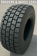 Radial loader tire with deep winter traction tread

20.5R25 OTR tire – sidewall and tread view

Premium mud and snow tire on display

Heavy-duty snow tire for construction equipment

Side-by-side comparison of OTR radial tires
