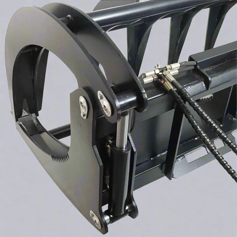 Front view of 72" grapple rake

84" skid steer root grapple in action

Dual hydraulic cylinders close-up

Grapple rake with wide jaw opening

Teeth and frame detail
