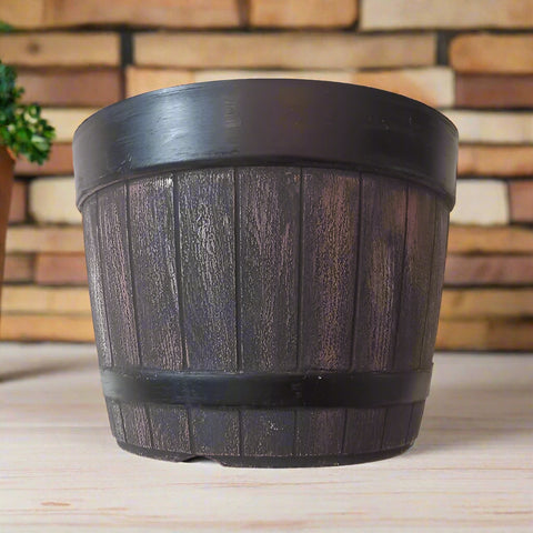 10-inch rustic whiskey barrel-style planter pot set of 5
Close-up of brown plastic whiskey barrel planter with woodgrain finish
Top view of whiskey barrel flower pot for indoor and outdoor gardening