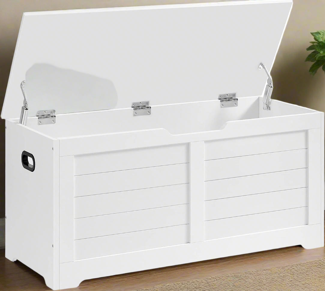 white storage bench with cushion in hallway
shoe bench with hidden storage compartment
cushioned seat chest for entryway organization
white wooden entryway bench with lift-top lid
modern shoe storage bench for bedrooms