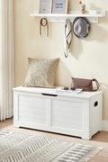 white storage bench with cushion in hallway
shoe bench with hidden storage compartment
cushioned seat chest for entryway organization
white wooden entryway bench with lift-top lid
modern shoe storage bench for bedrooms
