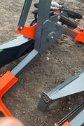 Skid Steer Tire Grabber & Handler – Heavy - Duty Hydraulic Attachment for Tire Loading | Model RMTG70 - with | Sold by Uncle Wiener's Wholesale