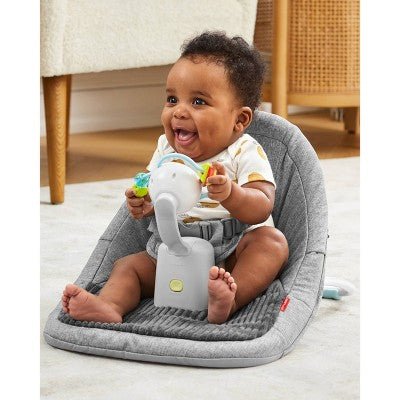 Skip Hop Baby Ergonomic Upright Activity Floor Seat with Toy - Gray. USED - with Dimensions (Overall): 12.85 Inches (H) x 21.75 Inches (W) x 16.25 Inches (D) | Sold by Uncle Wiener's Wholesale