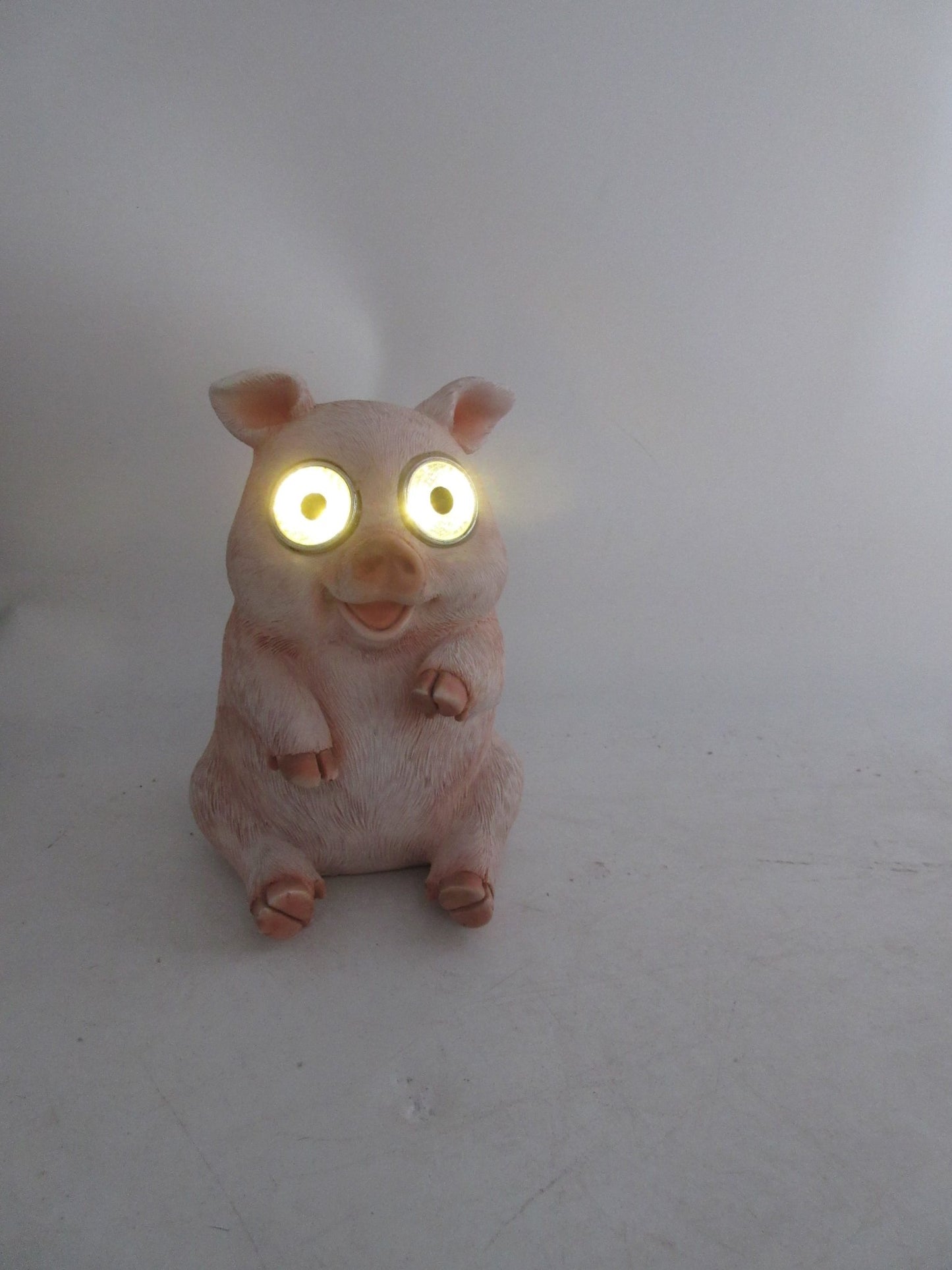 Solar Garden Statues with LED Lights Dog Frog Gnome Highland Cow Rabbit Cat Bear Collection KHSOLAR01 - with Pig with LED Eyes Solar Light | Sold by Uncle Wiener's Wholesale