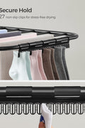 Foldable 2-Level Laundry Drying Rack - Full View
SONGMICS Drying Rack with Adjustable Wings - Side Angle
Foldable Drying Rack with Sock Clips - Close-Up
SONGMICS Indoor Drying Rack in Laundry Room
Foldable Laundry Drying Stand - Compact Storage Mode