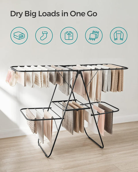 Foldable 2-Level Laundry Drying Rack - Full View
SONGMICS Drying Rack with Adjustable Wings - Side Angle
Foldable Drying Rack with Sock Clips - Close-Up
SONGMICS Indoor Drying Rack in Laundry Room
Foldable Laundry Drying Stand - Compact Storage Mode