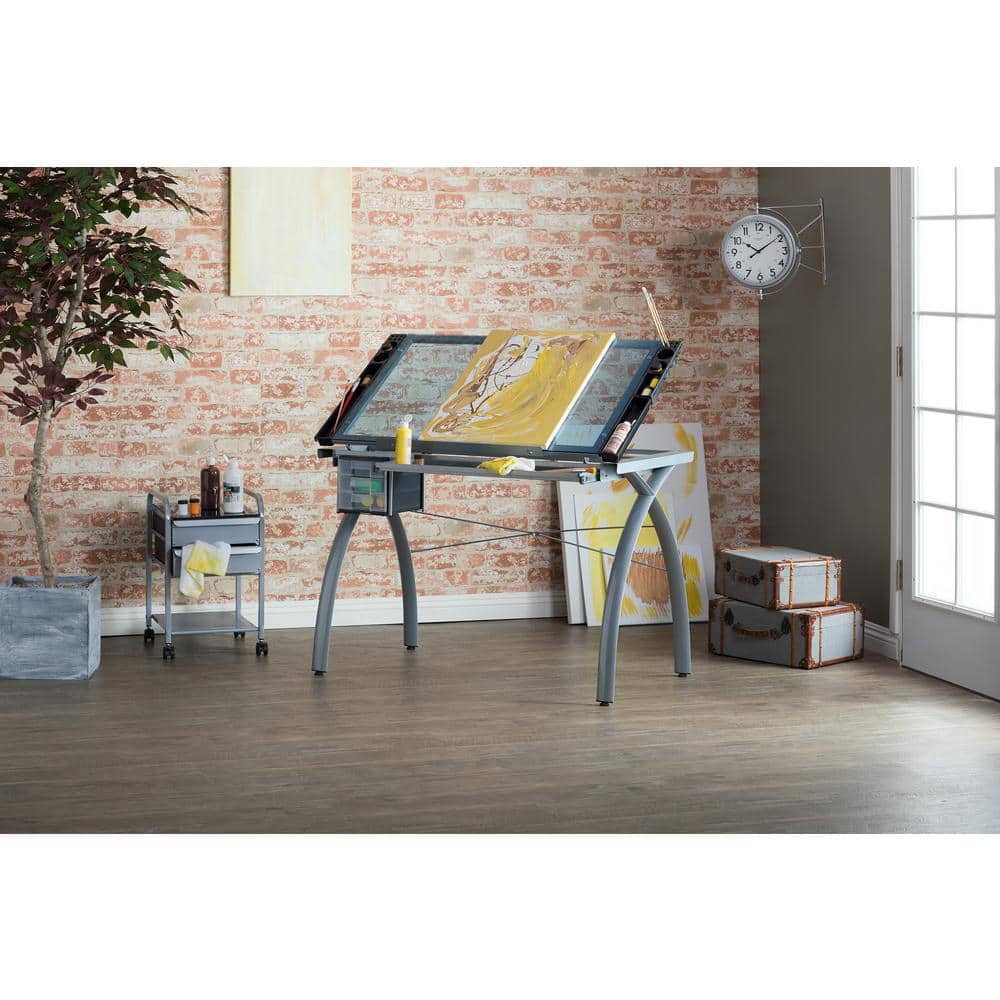 Studio Designs Futura Collection 38 in. W Silver/Blue Glass Metal and Glass Craft Table with Storage and Angle Adjustable Top - with Silver / Blue Glass | Sold by Uncle Wiener's Wholesale