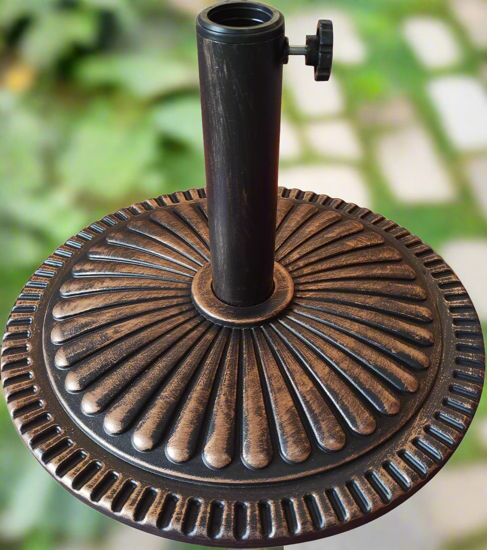 T&Jero 26 lb round bronze patio umbrella base – top view
Heavy duty umbrella base with adjustable knob for outdoor tables
T&Jero umbrella base pre-filled with concrete – compatible with 1.5 to 2-inch poles
Elegant sunflower design umbrella stand with rust-resistant metal stem