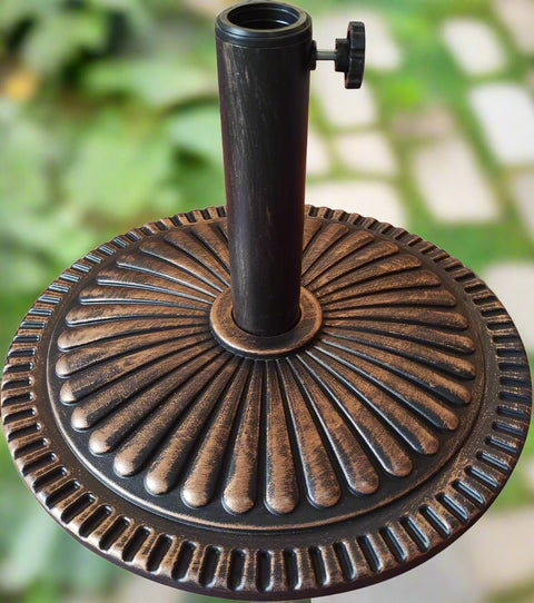T&Jero 26 lb round bronze patio umbrella base – top view
Heavy duty umbrella base with adjustable knob for outdoor tables
T&Jero umbrella base pre-filled with concrete – compatible with 1.5 to 2-inch poles
Elegant sunflower design umbrella stand with rust-resistant metal stem