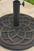 T&Jero 29 lb round bronze umbrella base with steel stem – top view
Umbrella base on patio – HDPE with sunflower pattern design
Pre-filled umbrella base with adjustable tightening knob – fits 1.5 to 2 inch poles
Bronze cast iron style HDPE base – outdoor market table umbrella stand