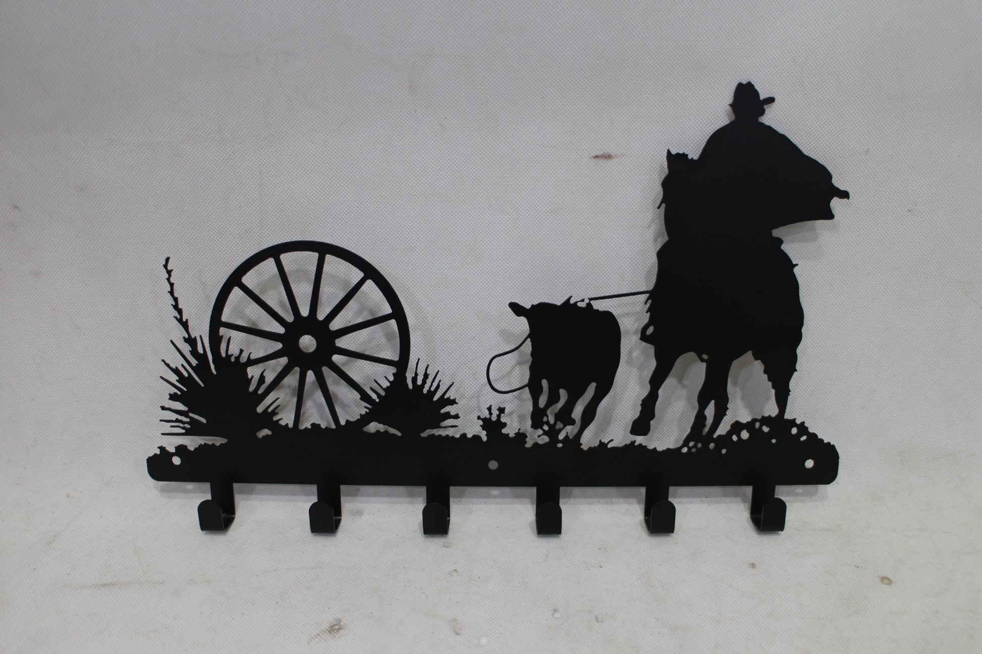 Western Metal Wall Hook Rack 17.75″ × 11″ – Rustic Coat & Key Holder (2 Designs) - with Deer & Forest Scene Hook Rack | Sold by Uncle Wiener's Wholesale