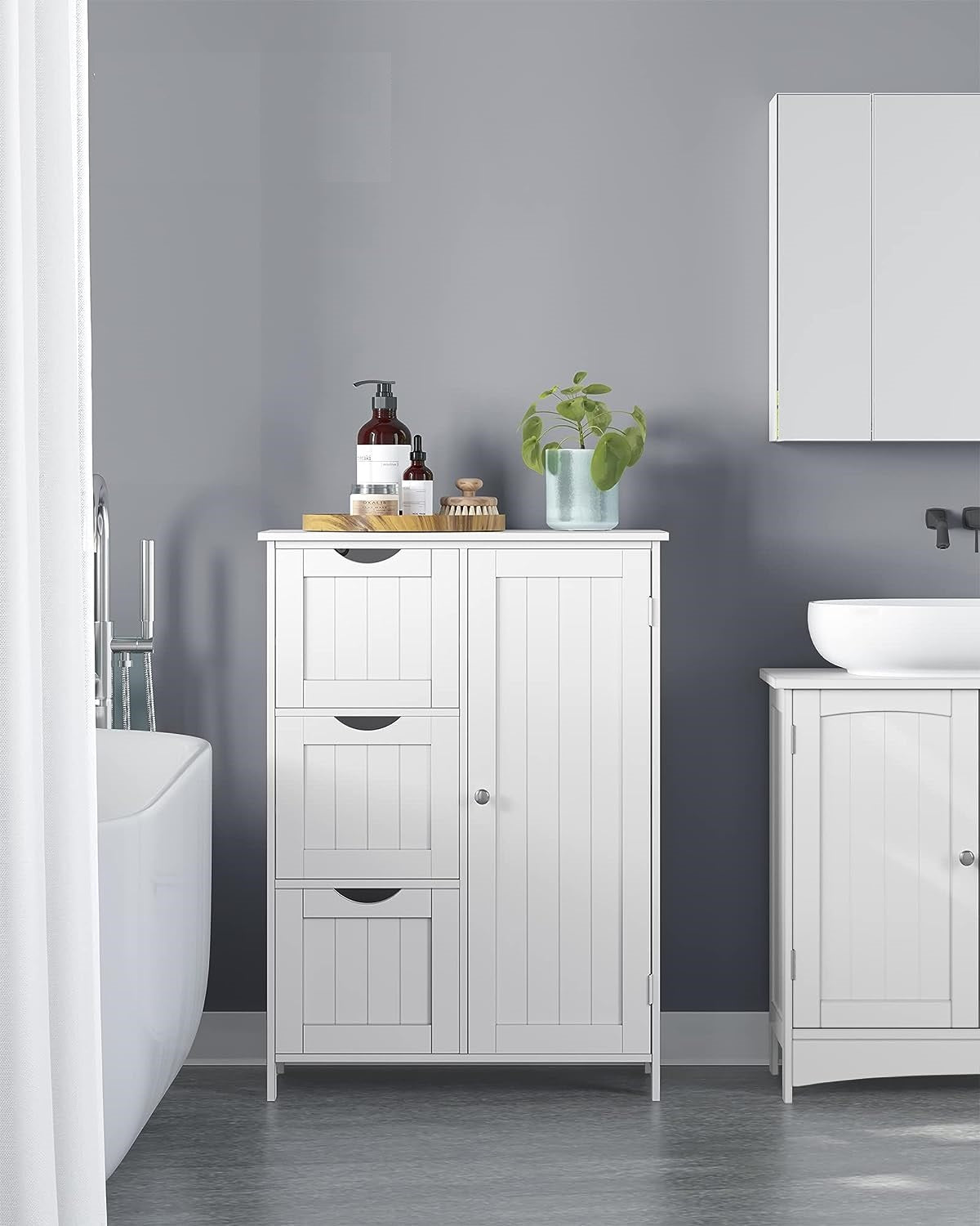 white bathroom cabinet with drawers and shelf
modern floor cabinet in white MDF
slim bathroom storage furniture
bathroom organizer with 3 drawers and adjustable shelf
compact cabinet for toiletries and towels