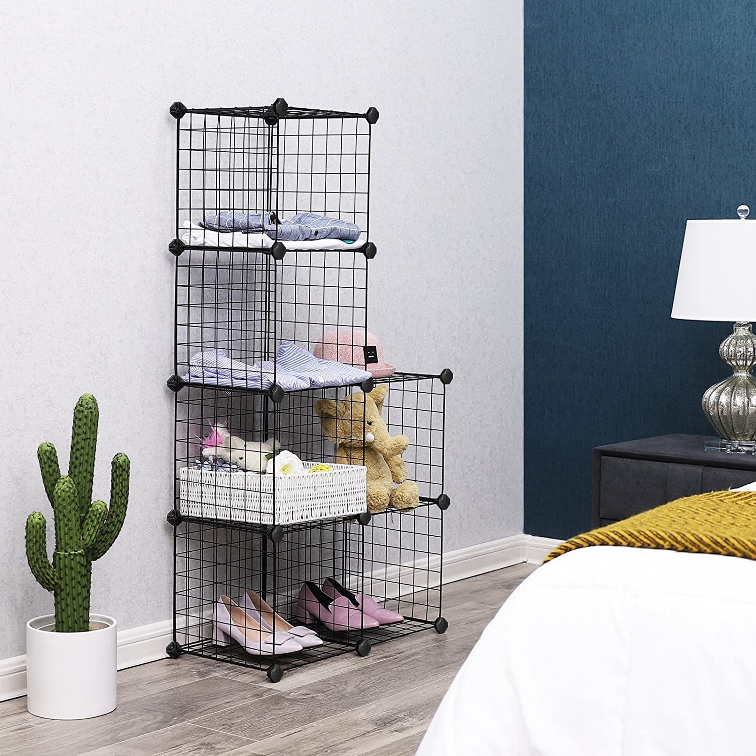 Wire grid shelving unit used in garage and bedroom for organized storage